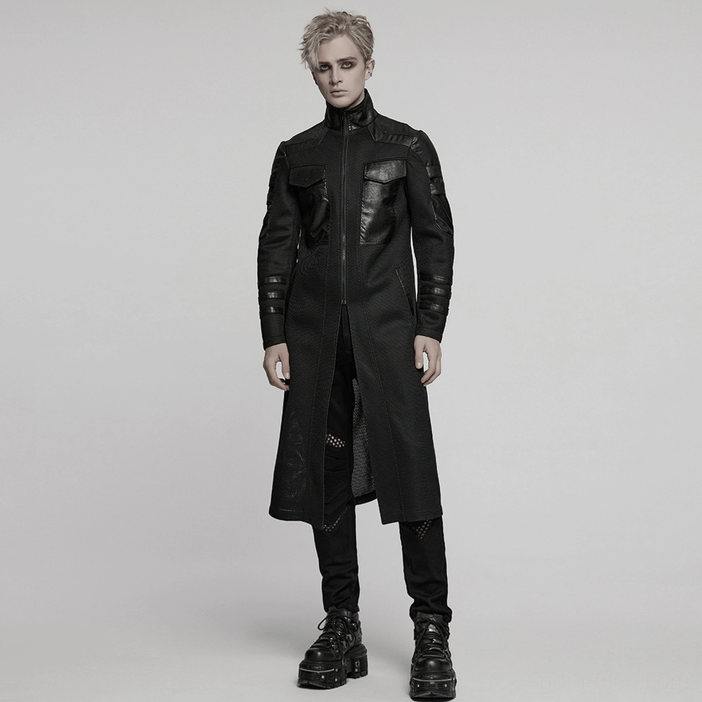 Black cyberpunk coat side profile flat lay showing geometric segmentation and mesh panel construction