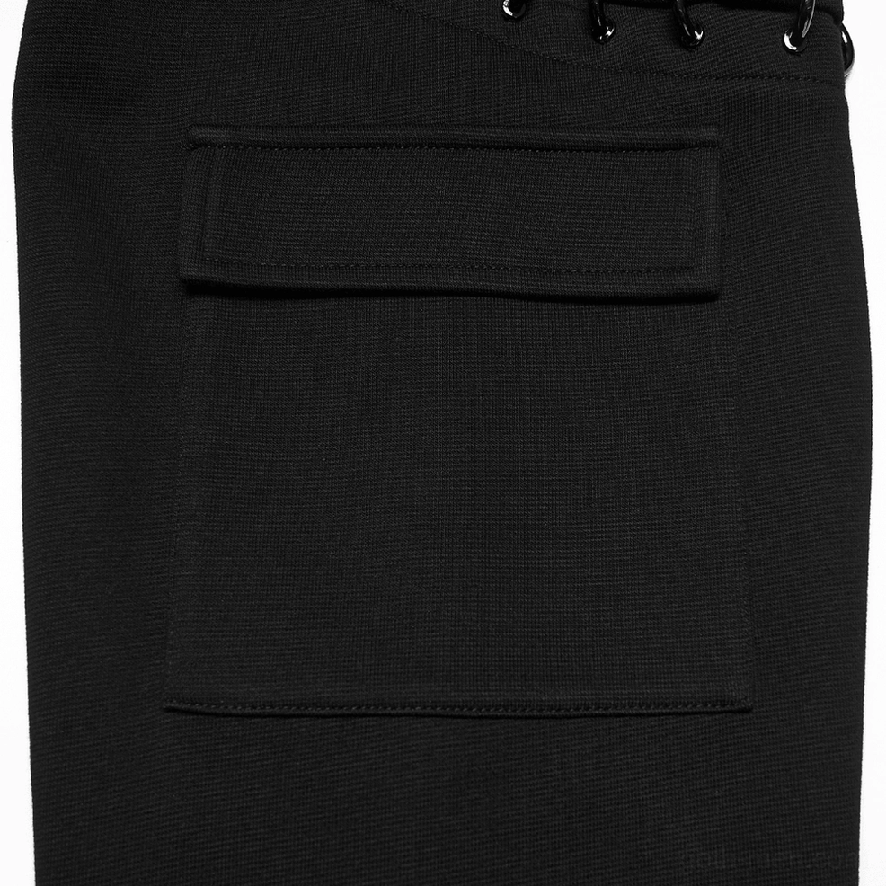 Flat close-up detail of black cyberpunk hoodie sleeve utility pocket with flap and topstitching