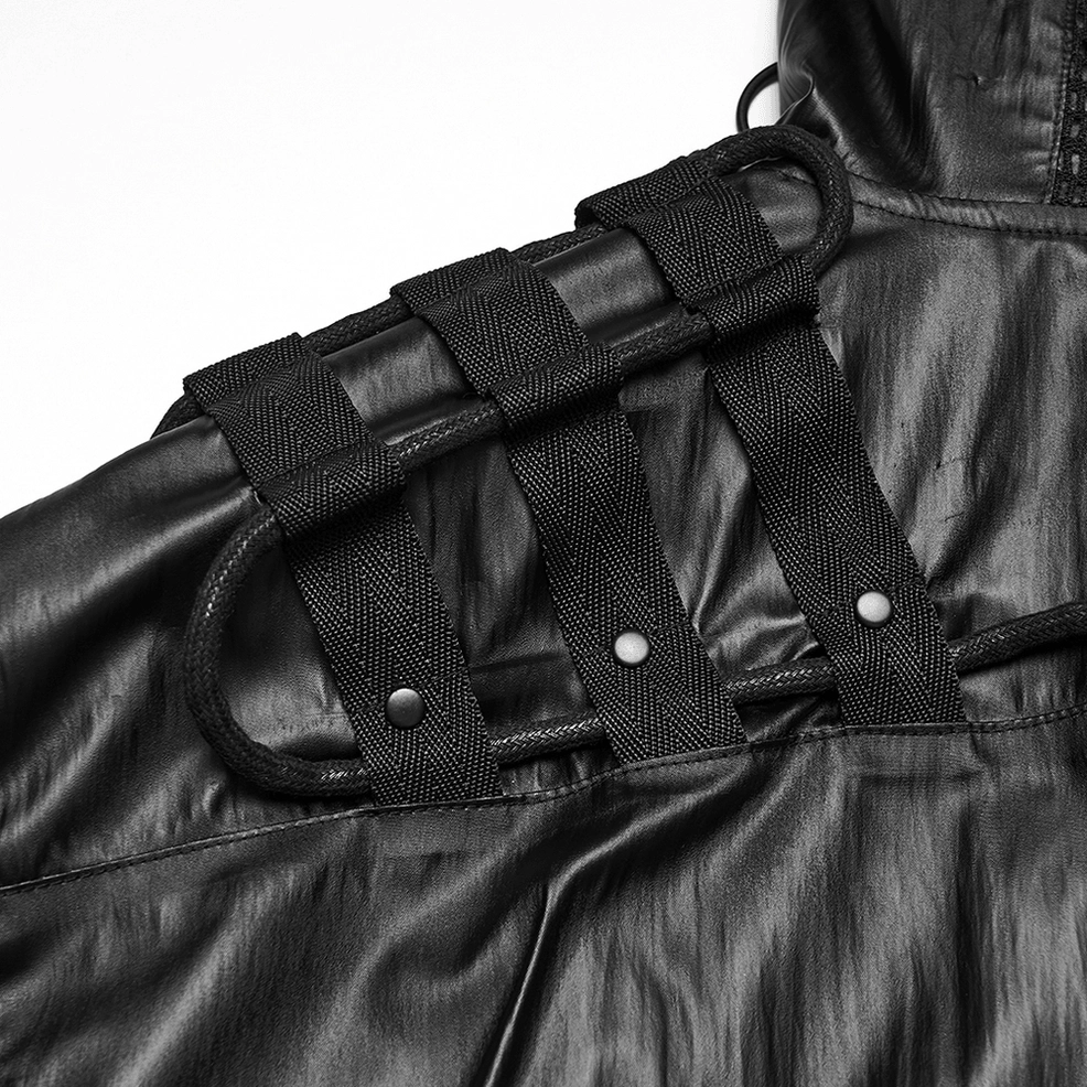 Close-up shoulder hardware detail of cyberpunk jacket with metal snaps and D-ring