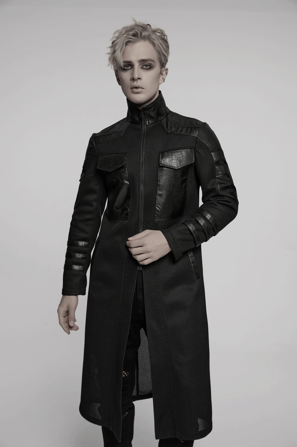 Black cyberpunk mesh tactical coat layered styling example with alternative fashion aesthetic