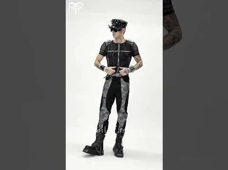 Black mesh studded t-shirt styled with biker pants and accessories on male model