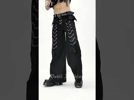 Black cyberpunk wide leg pants with architectural wing details and chain ornaments - back view