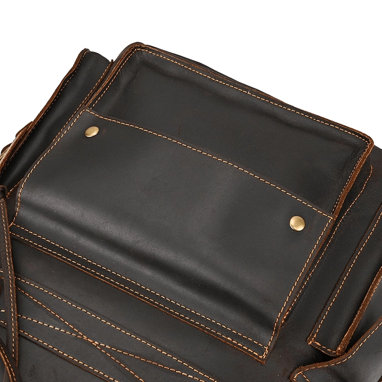 Dark brown cow leather gothic backpack with rivet accents and industrial aesthetic details