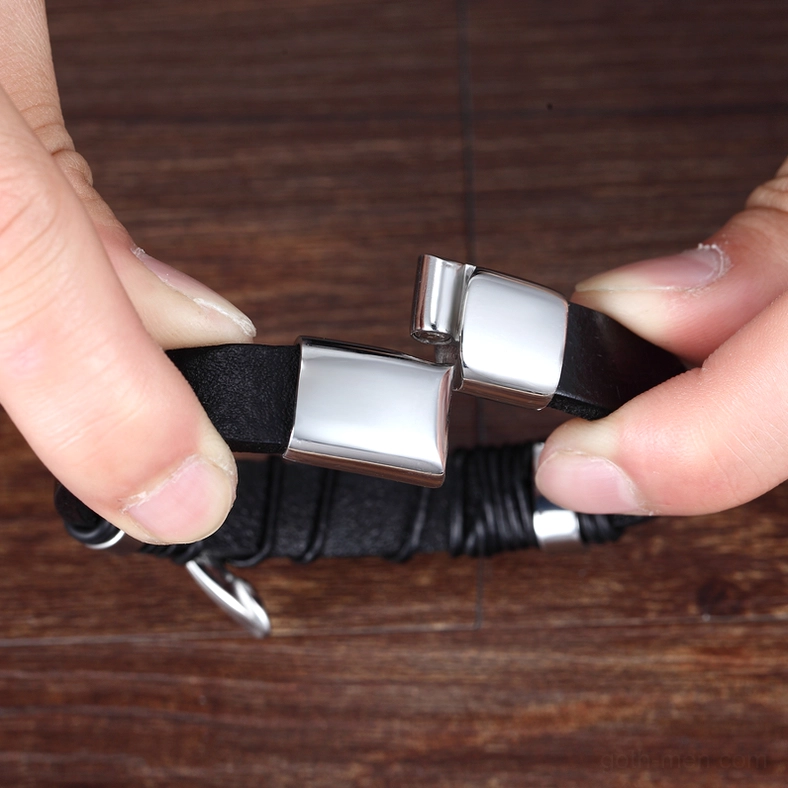 Dark feather leather bracelet in gothic occult style, complete product showcase with all hardware details visible