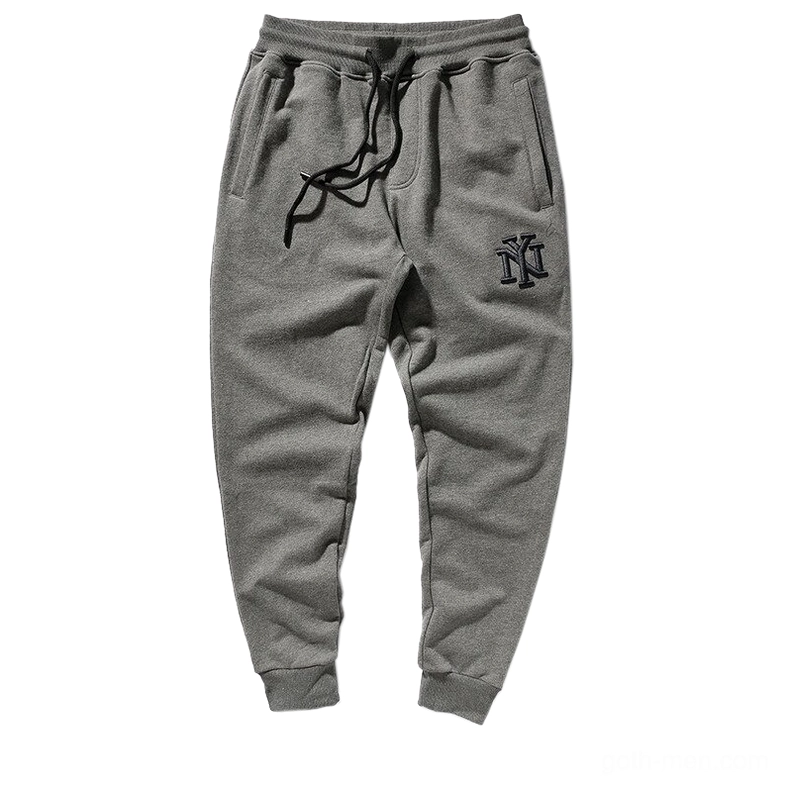 Dark heather grey harem joggers with black NY embroidery, flat lay view, gothic sweatpants for men