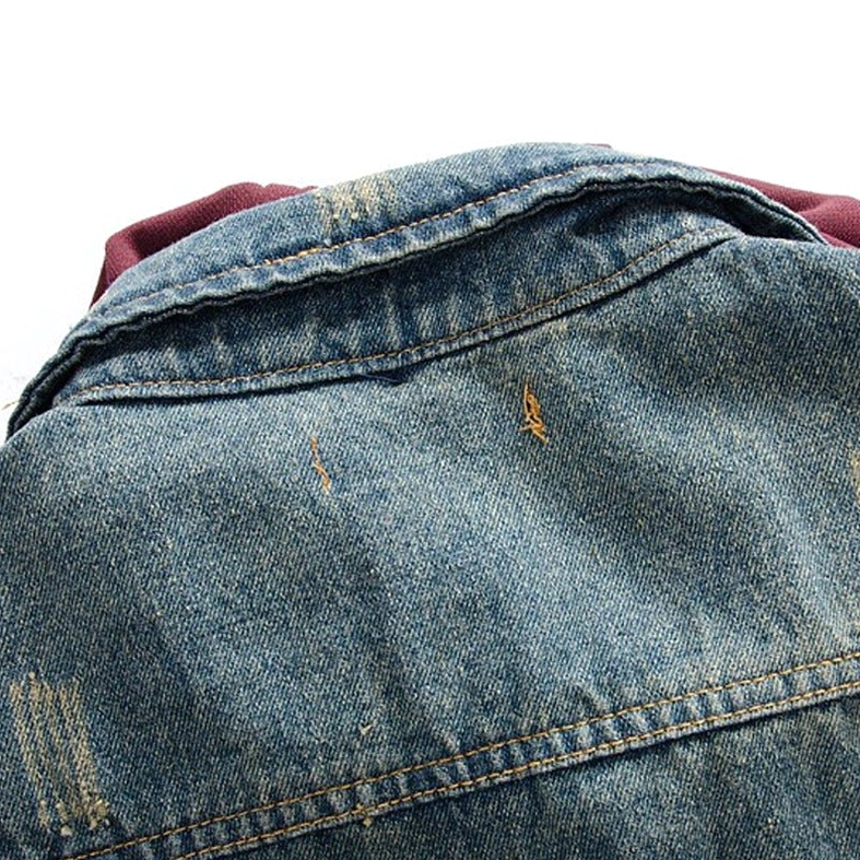 Denim vest shoulder distressing detail - grunge aesthetic scratch marks and stitching on gothic streetwear