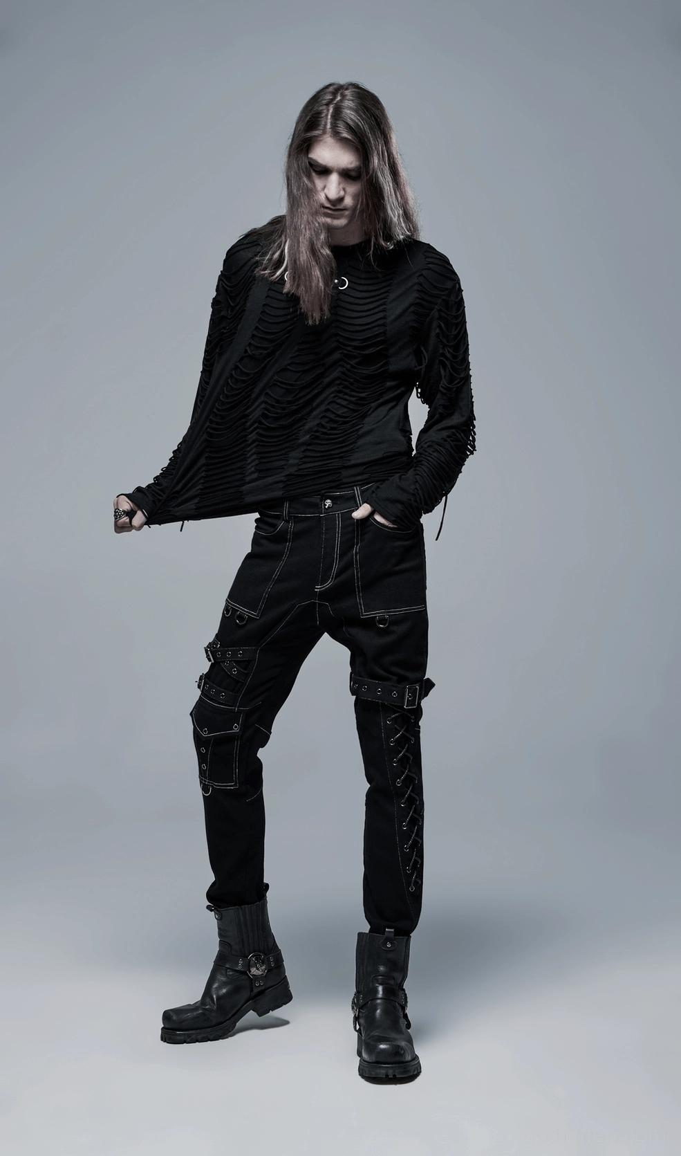 Model wearing black skeleton ripped gothic sweatshirt showing layering possibilities and sleeve details