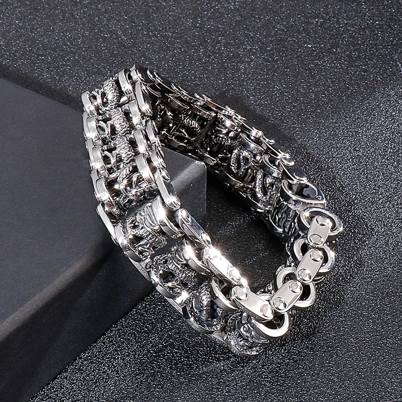 Heavy linked dragon patterned stainless steel bracelet embossed details vintage finish