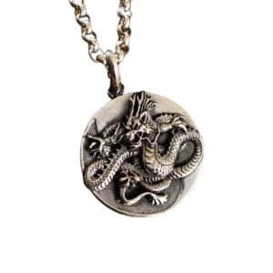 Dragon mythical beast sterling silver gothic pendant high relief embossed studio view