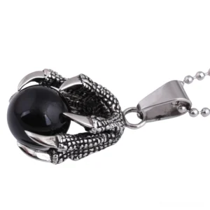 Gothic dragon claw pendant with black crystal stone - side profile revealing detailed metalwork and vintage silver finish