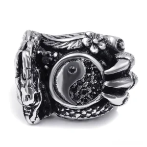 Dragon claw gothic ring front side view displaying yin yang symbol and carved claw engravings in vintage silver