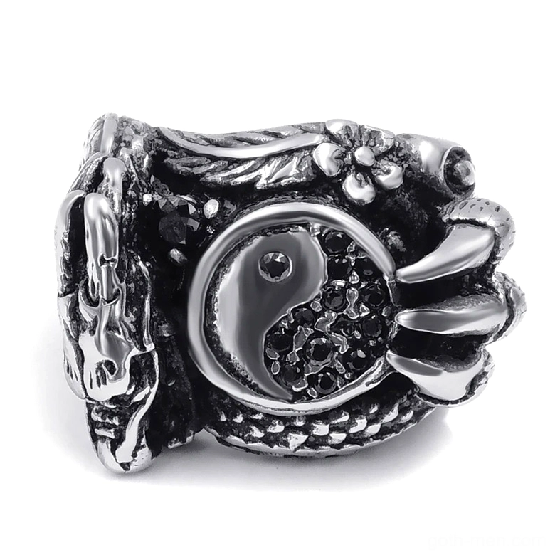 Dragon claw gothic ring front side view displaying yin yang symbol and carved claw engravings in vintage silver