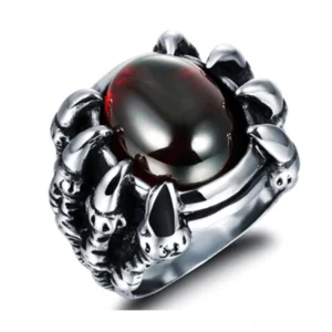 Dragon claw gothic ring with wine red cubic zirconia stone, silver stainless steel claw setting, front oblique view