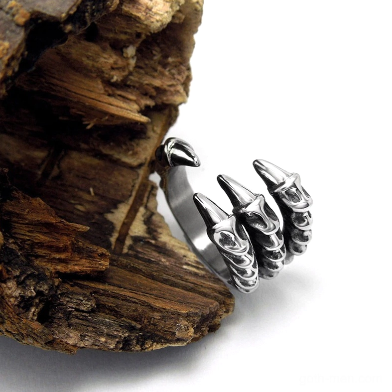 Dragon claw ring right side oblique view displaying polished vintage silver finish with textured spike details