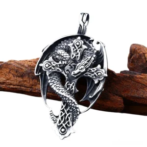 Dragon cross pendant with intricate Celtic knot details vintage silver polished finish flat lay