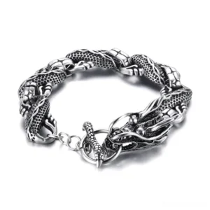 vintage dragon stainless steel bracelet overhead flat lay antique silver gothic chain with embossed dragon motif toggle clasp