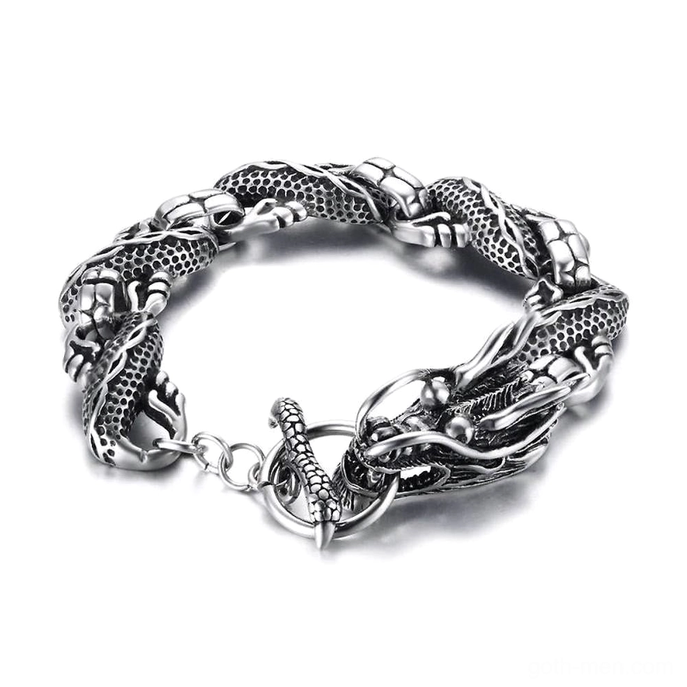 vintage dragon stainless steel bracelet overhead flat lay antique silver gothic chain with embossed dragon motif toggle clasp