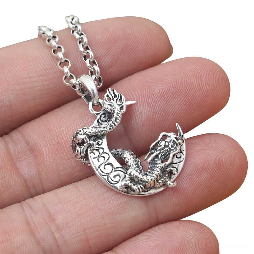 S925 sterling silver dragon moon pendant close-up showing three-dimensional dragon sculpture and crescent moon design