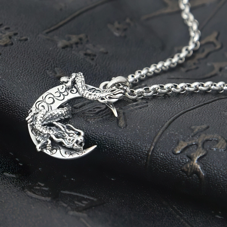 S925 sterling silver dragon moon pendant on rolo chain showing polished silver finish and gothic necklace styling