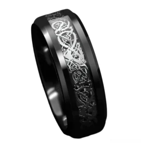 Dragon ring side oblique angle showing beveled edges and engraved Celtic dragon pattern