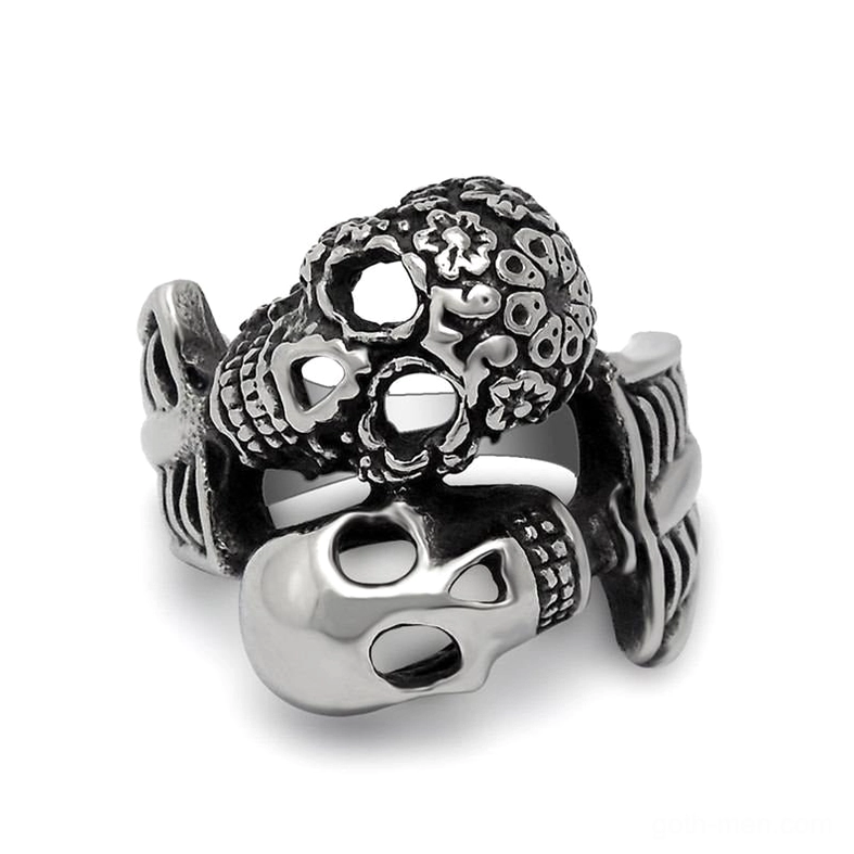 Dual skull gothic ring stainless steel front view darkened details on white background
