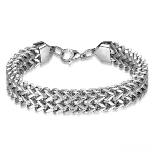 Dual-strand wheat chain gothic bracelet with lobster clasp, overhead view showing interlocking chain links and polished stainless steel finish