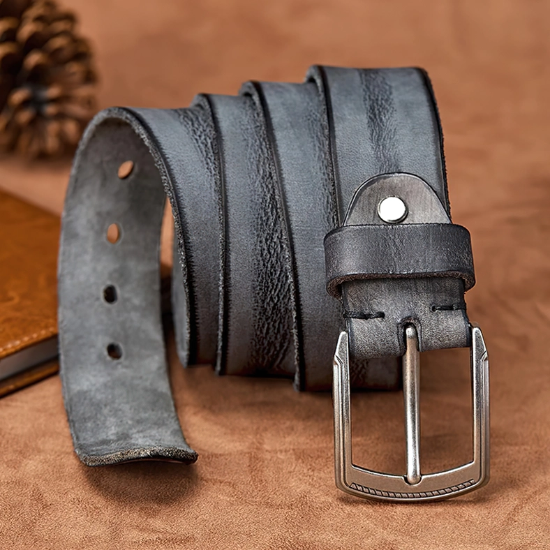 Handcrafted gothic belt in rich earth tone with antique alloy buckle, demonstrating full grain cowhide character and alternative fashion versatility
