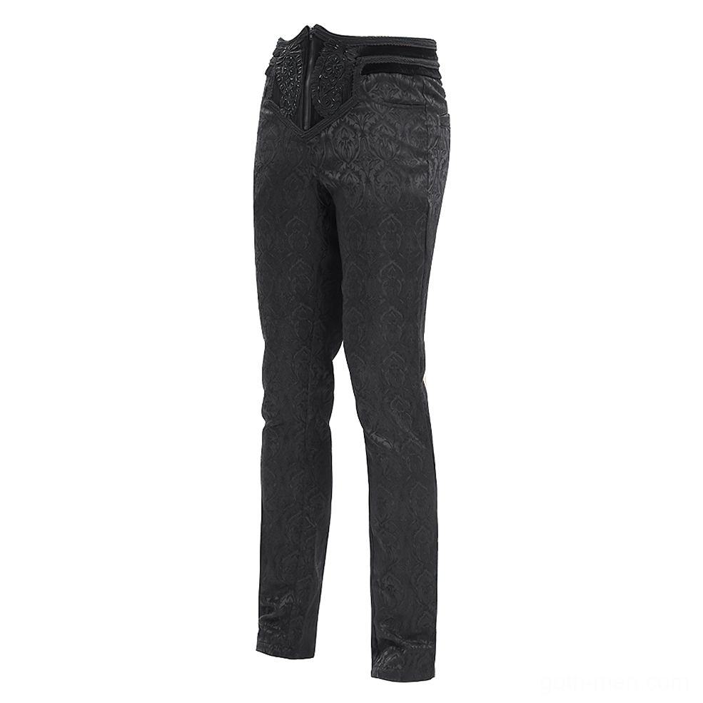 Black embossed dress pants side-front view, showcasing velvet waistband, damask jacquard fabric detail, and slim leg cut on hanging display
