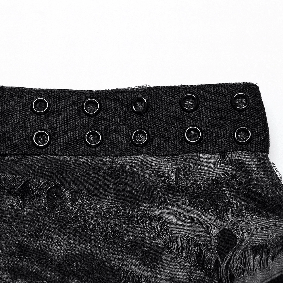 Eyelet webbing shoulder strap close-up - metal eyelet fasteners and distressed fabric