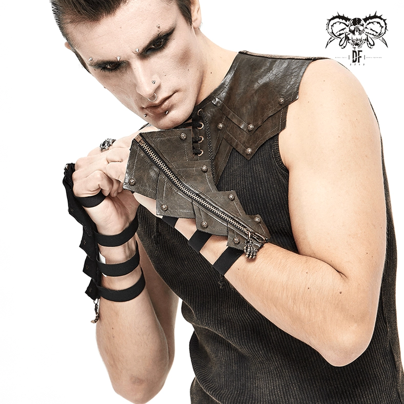 Side half-body shot of man in gothic styling wearing brown leather fingerless gloves with brass riveted details