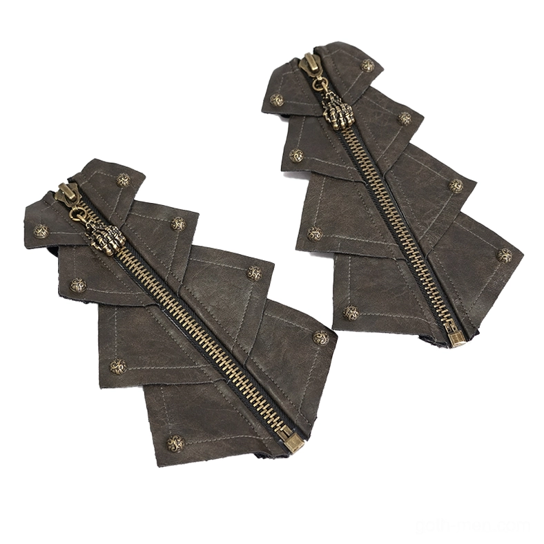 Flat lay of brown leather fingerless gloves showing skull-shaped zipper puller and jagged panel design