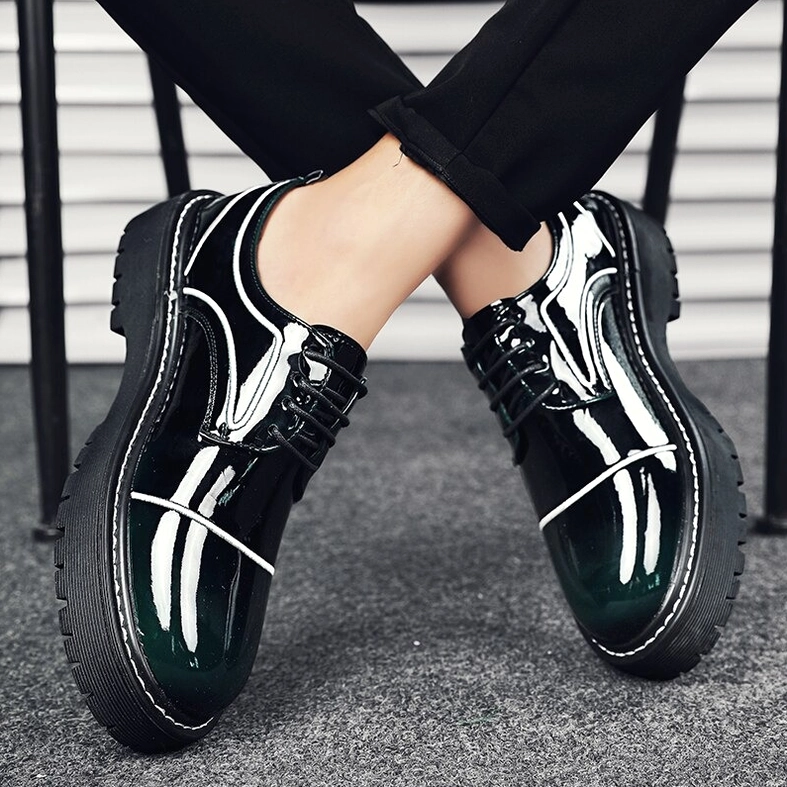 Dark green men's oxford platform shoes overhead side view with white stitching lug sole detail