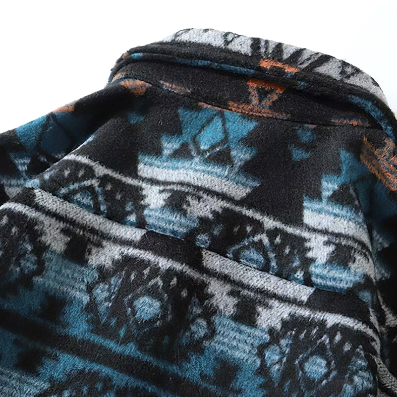 Geometric tribal print fabric texture close-up fuzzy fleece material detailed Aztec patterns