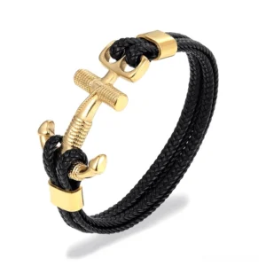Gold gothic anchor leather bracelet with braided black rope chain design and stainless steel anchor clasp, front view