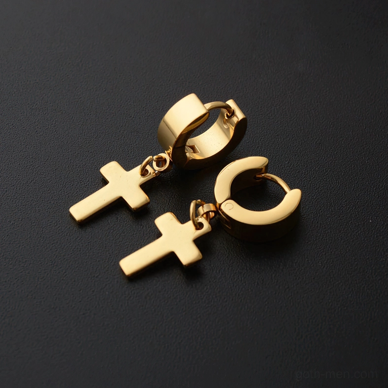 Gold stainless steel gothic cross dangle huggie earrings - ornate drop pendant flat lay