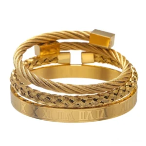 Gold tone 3-piece gothic stainless steel bangle set featuring mixed twisted woven and flat cuff styles with Roman engravings