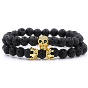 Gold-toned memento mori skull crown beaded bracelet with natural black stone beads - luxe gothic unisex jewelry