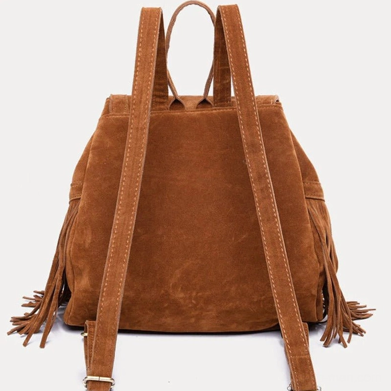Rear view of brown suede alternative fashion backpack displaying dual shoulder straps and back design