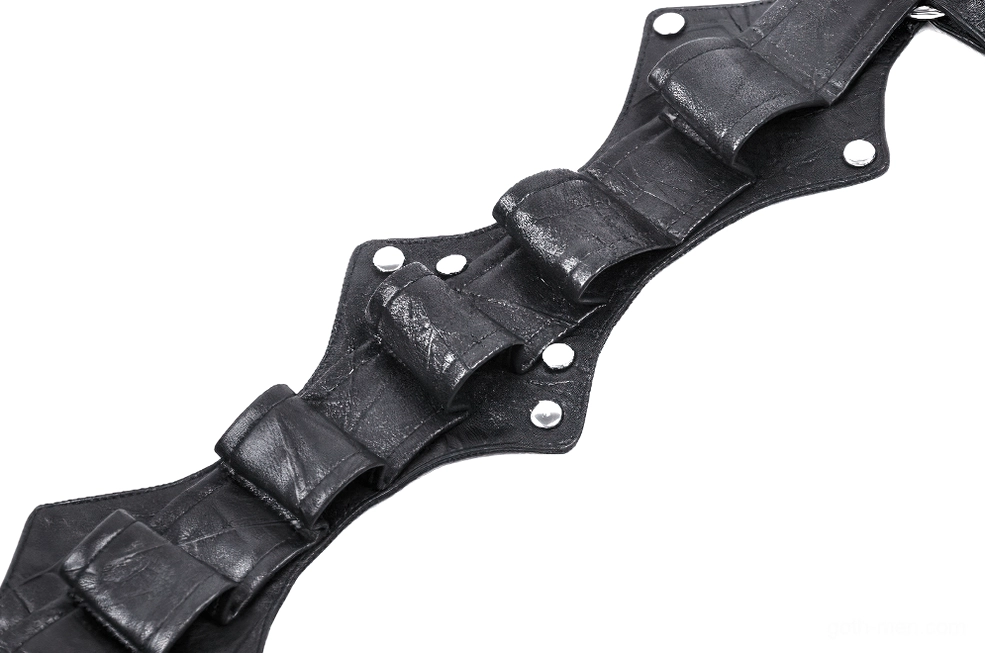 Close-up detail of black faux leather gothic harness showing silver rivets and texture of material