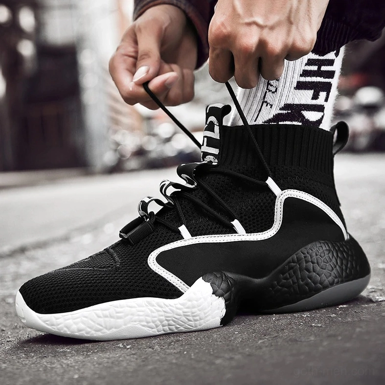 Goth-inspired high-top lace-up sneaker with bold design and durable rubber outsole casual wear