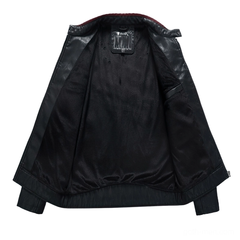 Close-up of smooth black polyester lining inside men's gothic motorcycle jacket