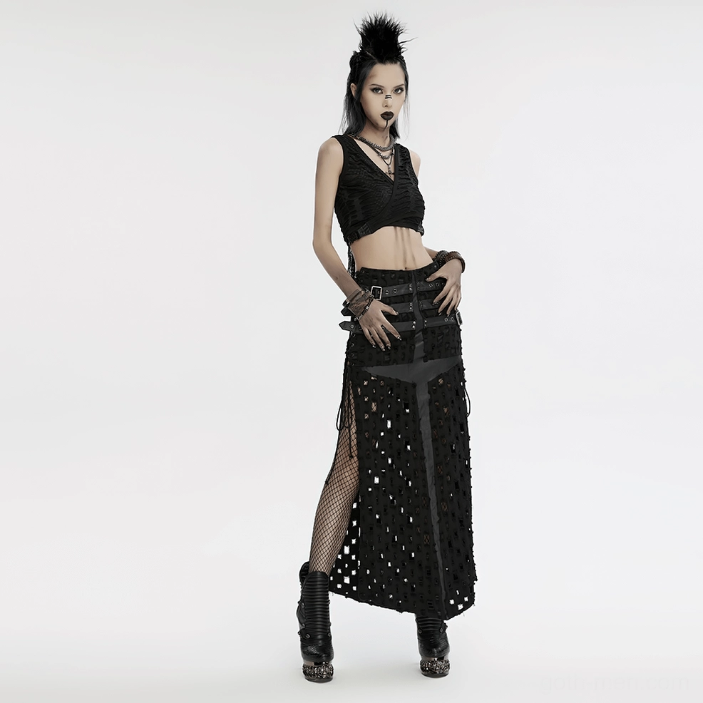 Full-body gothic punk model styling with leather bracelet set, alternative fashion outfit with cropped top, mesh skirt, and combat boots, statement accessories