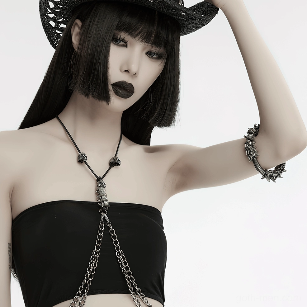 Gothic model half-body wearing spike bracelet with black tube top and cowboy hat aesthetic