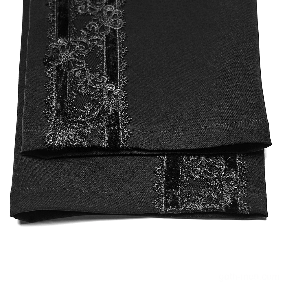 Side seam detail of gothic trousers - ornate embroidered lace panel with velvet backing