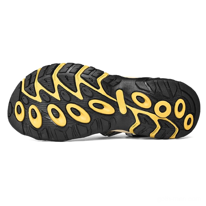 Anti-skid rubber outsole with aggressive yellow tread pattern for superior grip and traction
