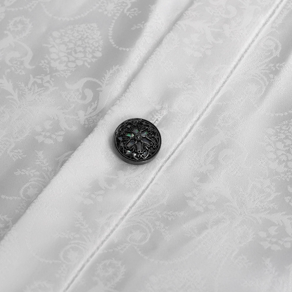 Close-up of Victorian gothic white shirt bell sleeve and smocked cuff construction showing ornate craftsmanship, ruffle layering, and embroidered lace ornamentation