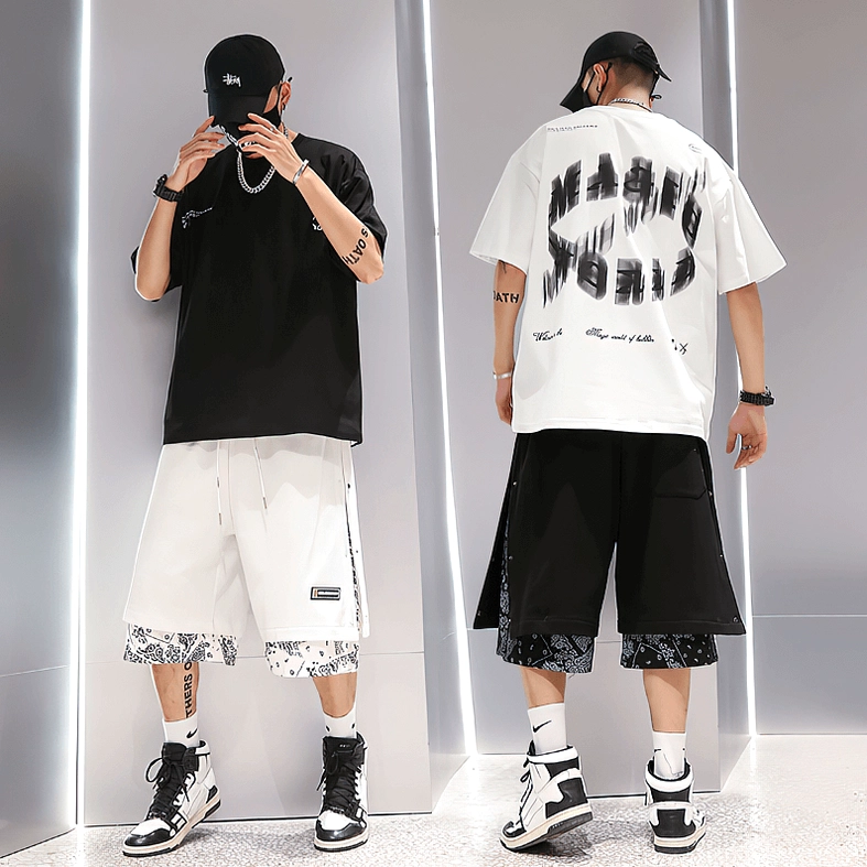 Black and white goth shorts collection showing color contrast and alternative streetwear versatility for men
