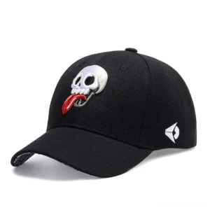 Black gothic skull embroidered baseball cap side view showing embroidered skull design with red tongue trim