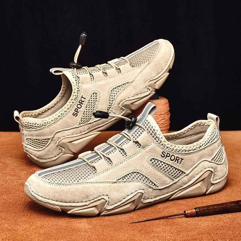 Alternative goth sneaker close-up - mesh breathing zones and toggle lace construction detail