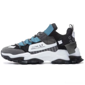 Alternative style sneakers side profile blue accent color scheme branded label chunky rubber outsole